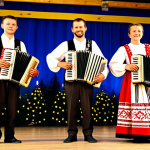 **

A professional photograph of a Slovakian folk band performing on a brightly lit stage, fully clothed in traditional Slovakian attire, appropriate content, safe for work, perfect anatomy, natural proportions. The musicians are playing traditional instruments like the accordion, cymbalom, and fujara. The background features a festive setting with traditional Slovakian decorations. Family-friendly, professional.

**
