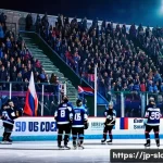 슬로바키아 vs 세르비아 스포츠 인기 종목 - A vibrant ice hockey game scene in Slovakia during winter, showing a local outdoor rink surrounded b...